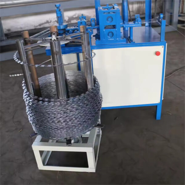 Concertina razor wire coiling machine operating in a factory