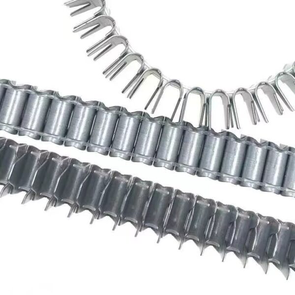 Close-up of galvanized clinch clip on razor wire