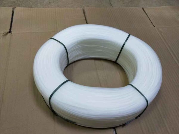 "Plastic wire coil with M45 clips loaded for use"